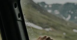 Car Radio In The Rain "Car Radio In The Rain" captures the serene experience of commuting alone during a rainy day,