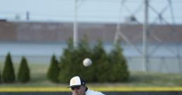 Young pitcher in action at a TF Baseball Game, delivering a fastball on the mound, focused on striking out the batter.
