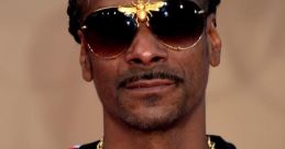 Snoop Dog Snoop Dog is a name that is synonymous with the world of hip-hop and rap. With a career spanning over three