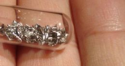 Iridium The of "Iridium, Iridium" rings out in a sharp, metallic tone that cuts through the air like a knife. It's a