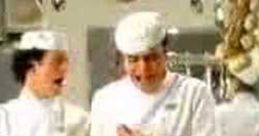 Chefs excitedly prepare a meal in a vibrant kitchen, showcasing the joy of cooking with Chicken Tonight ingredients.