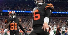 Cleveland Browns player celebrates a touchdown, showcasing team spirit in a vibrant stadium atmosphere. Coors Light vibe.