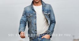 Man walking in a Levi's 501 jean and denim jacket, showcasing casual style and timeless fashion in an urban setting.