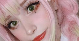 Egirl with pastel pink hair and vibrant green eyes, adorned with flowers, showcasing a cute and vibrant aesthetic.