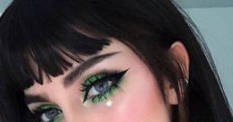 E-girl style featuring vibrant green eye makeup, bold dark lipstick, and a chic choker, showcasing edgy fashion aesthetics.