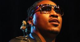 Future performing live on stage, showcasing his signature style with sunglasses and a leather jacket, exuding hip-hop charisma.