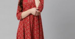 Elegant red kurta with intricate golden patterns, perfect for festive occasions or casual wear in Desi Beats style.