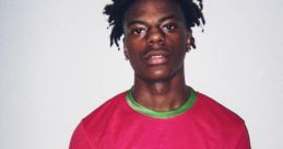 Young man wearing a red "I Show Speed" shirt, showcasing a confident expression against a plain background.