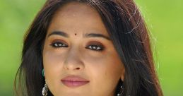 Anshka The first that fills the air is a soft, melodic whisper of "Uyirin Uyire." It is a tender lullaby that seems to