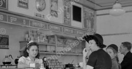Diner The familiar clinking of silverware against plates and the subtle murmur of conversation fill the air as people gather