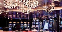 Elegant casino interior featuring a roulette table, illuminated chandeliers, and vibrant slot machines in a luxurious setting.