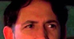 Confused hitchhiker from "There's Something About Mary" looks concerned during an awkward car ride.
