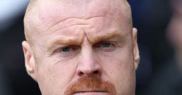 Sean Dyche displaying a focused expression while managing Burnley, known for his tactical approach to football.