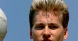 Iceman from Top Gun with a focused expression, showcasing a confident demeanor on a sunny day.