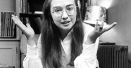 Hillary Rodham Clinton in striped pants and glasses, gesturing thoughtfully in a vintage setting, showcasing her youthful style.
