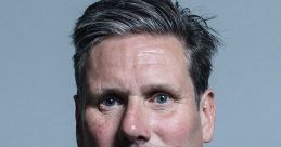 Keir Starmer, Leader of the Labour Party, in a formal suit with a neutral background, showcasing his leadership presence.