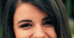 Rebecca Black smiles brightly in a scene from the iconic "Friday" music video, embodying youthful energy and fun.