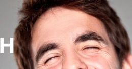 Joyful man laughing heartily, showcasing genuine happiness and the uplifting effects of laughter on well-being.