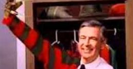 Mr. Rogers playfully poses with a puppet in a colorful striped sweater, showcasing his lighthearted prankster side.