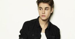Justin Bieber showcasing a stylish look, exuding confidence, perfect for fans of "Boyfriend." Iconic pop star vibe captured.