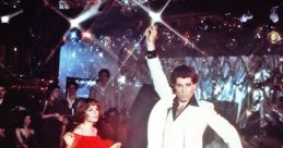 Dancers on a vibrant disco floor, capturing the iconic energy of "Saturday Night Fever" with a disco ball overhead.