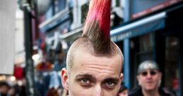 Punk style individual features vibrant mohawk and leather jacket, embodying the spirit of rebellion and unique fashion.