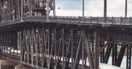 Trains Crossing Metal Bridge