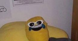 Person wearing a yellow mask and sunglasses, casually lounging on a yellow pillow, embodying quirky humor and Florida vibes.
