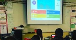 Students engaging in a Kahoot gameshow, answering questions on tablets in a classroom setting. Learning through interactive quizzes.
