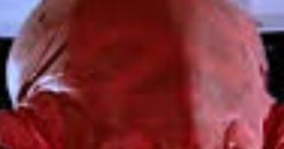 Red alien character with unique features, showcasing distinct facial structure. Iconic sci-fi figure in a futuristic setting.