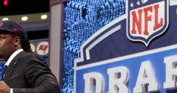 Player on stage excited during the 2014 NFL Draft, celebrating a significant career milestone in professional football.