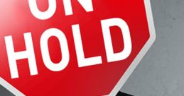 Business professional holding a red "ON HOLD" sign, symbolizing paused services or important notifications.