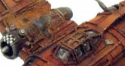 Detailed Ork Flyboy aircraft from Warhammer 40,000, showcasing unique rust patterns and combat-ready design features.