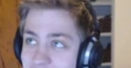 Sodapoppin laughing while gaming, wearing headphones and a striped shirt, with a casual background.
