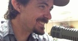 Zane smiles while performing at Sings Cafe, showcasing talent in the Very Fast song generator session.