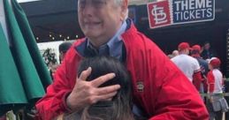 Emotional reunion at a baseball game, featuring a joyful embrace and the excitement of a live sporting event atmosphere.