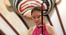 Erhu The Erhu is a traditional Chinese string instrument known for its hauntingly beautiful . When played, it produces a