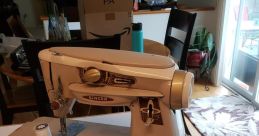 Sewing-Machine The Alfanext45 sewing machine hummed softly, its mechanical whirring filling the room as the fabric was fed