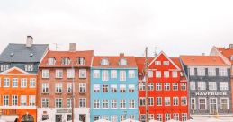 Copenhagen The sharp blast of a horn echoes through the bustling platform as a train passes through Copenhagen. The