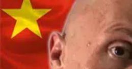 Close-up of a man with a bald head, set against the backdrop of the Chinese flag, highlighting a humorous meme for 2024.