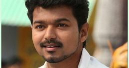 Vijay smiles confidently, showcasing his signature style in a casual outfit, capturing the essence of Tamil cinema charisma.