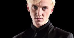 Draco Malfoy in a sleek black suit, exuding confidence and a hint of arrogance from the Harry Potter movie series.