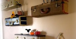 Suitcase Library The distinct of a suitcase being zipped shut fills the room as the final preparations are made for the