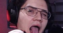 El Mariana playfully poses with a puppet, showcasing his signature humor and engaging personality during a streaming session.
