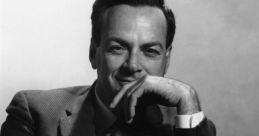 Black and white portrait of physicist Richard Feynman, showcasing his thoughtful expression and engaging smile.