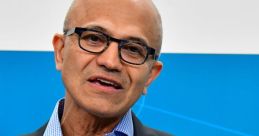 Satya Nadella discusses technology and innovation at a Microsoft event, showcasing his leadership as CEO.