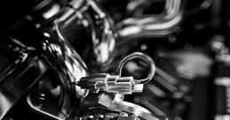 Mechanical The whirring of gears and the clanking of metal reverberated through the workshop as the mechanical arm swung