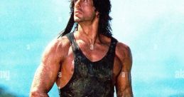 Rambo, portrayed by Sylvester Stallone, stands in a dramatic pose, holding an assault rifle in a rugged, outdoor setting.