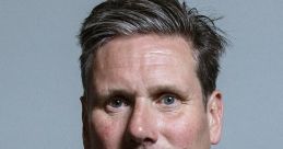 Keir Starmer, leader of the Labour Party, poses in formal attire, emphasizing his political image and leadership qualities.