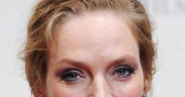 Uma Thurman showcases elegance at the British Film Awards, stunning with a diamond necklace and glamorous makeup.